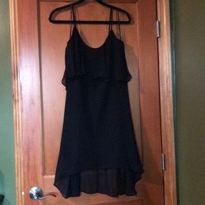 Black mid-length dress.
